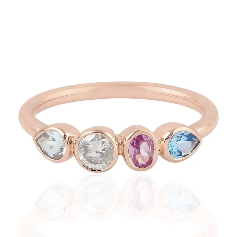 Rose Gold Ring Featuring Blue Topaz, Aquamarine, And Pink Sapphire Gemstones 1